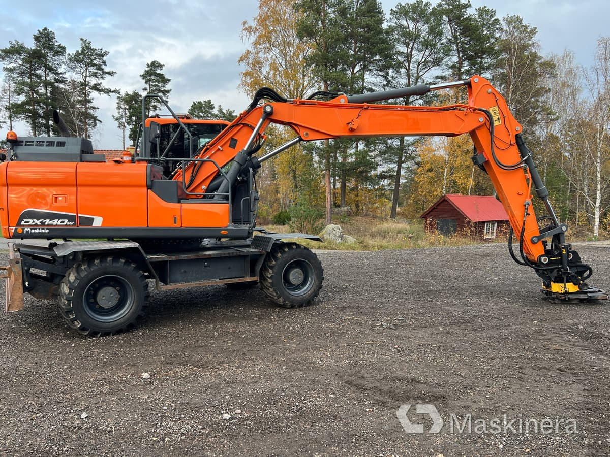 Hjulgrävare Doosan DX140-5 - Telakaivukone: kuva Hjulgrävare Doosan DX140-5 - Telakaivukone Hjulgrävare Doosan DX140-5 - Telakaivukone: kuva Hjulgrävare Doosan DX140-5 - Telakaivukone