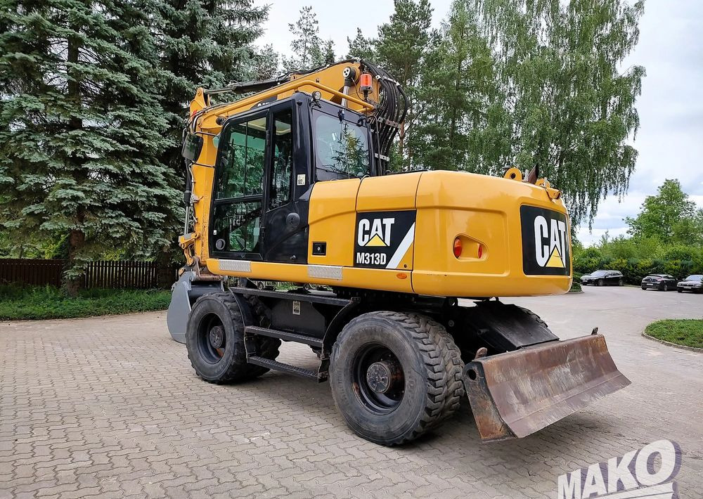 Caterpillar M313D - Pyöräalustainen kaivinkone: kuva Caterpillar M313D - Pyöräalustainen kaivinkone Caterpillar M313D - Pyöräalustainen kaivinkone: kuva Caterpillar M313D - Pyöräalustainen kaivinkone