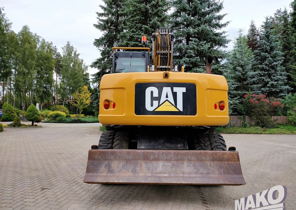 Caterpillar M313D - Pyöräalustainen kaivinkone: kuva Caterpillar M313D - Pyöräalustainen kaivinkone Caterpillar M313D - Pyöräalustainen kaivinkone: kuva Caterpillar M313D - Pyöräalustainen kaivinkone