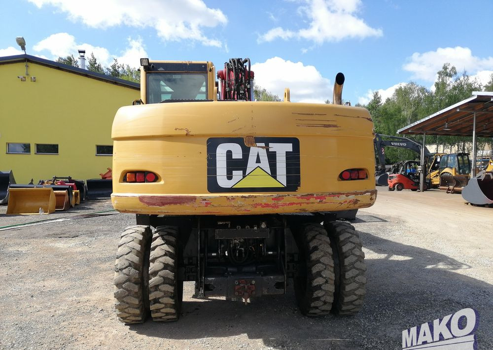 Caterpillar M315 C - Pyöräalustainen kaivinkone: kuva Caterpillar M315 C - Pyöräalustainen kaivinkone Caterpillar M315 C - Pyöräalustainen kaivinkone: kuva Caterpillar M315 C - Pyöräalustainen kaivinkone