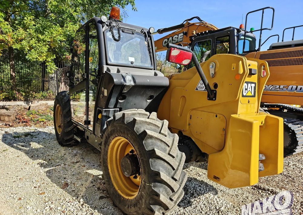 Caterpillar TH407 - Kurottaja: kuva Caterpillar TH407 - Kurottaja Caterpillar TH407 - Kurottaja: kuva Caterpillar TH407 - Kurottaja