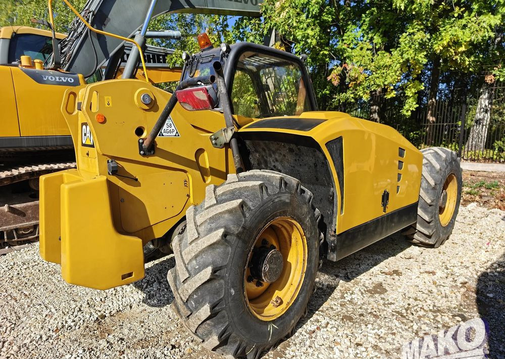 Caterpillar TH407 - Kurottaja: kuva Caterpillar TH407 - Kurottaja Caterpillar TH407 - Kurottaja: kuva Caterpillar TH407 - Kurottaja