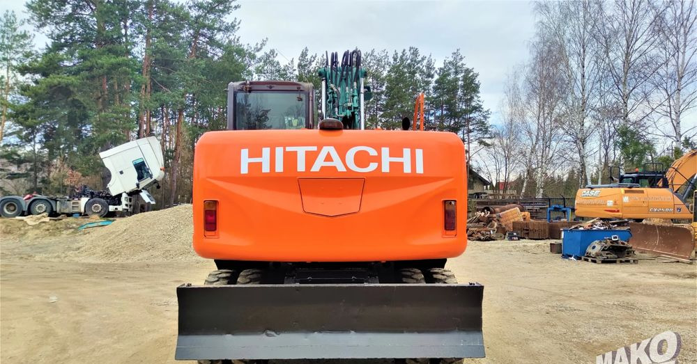 Hitachi ZX140W-3 - Pyöräalustainen kaivinkone: kuva Hitachi ZX140W-3 - Pyöräalustainen kaivinkone Hitachi ZX140W-3 - Pyöräalustainen kaivinkone: kuva Hitachi ZX140W-3 - Pyöräalustainen kaivinkone