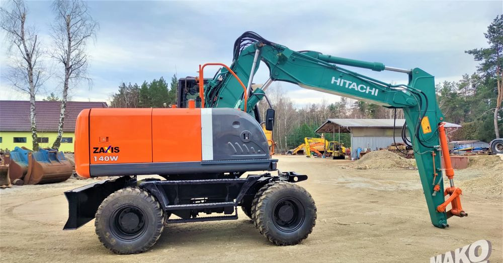 Hitachi ZX140W-3 - Pyöräalustainen kaivinkone: kuva Hitachi ZX140W-3 - Pyöräalustainen kaivinkone Hitachi ZX140W-3 - Pyöräalustainen kaivinkone: kuva Hitachi ZX140W-3 - Pyöräalustainen kaivinkone