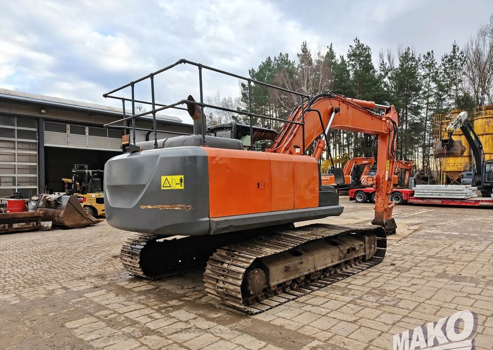 Hitachi ZX210LC-5B - Telakaivukone: kuva Hitachi ZX210LC-5B - Telakaivukone Hitachi ZX210LC-5B - Telakaivukone: kuva Hitachi ZX210LC-5B - Telakaivukone