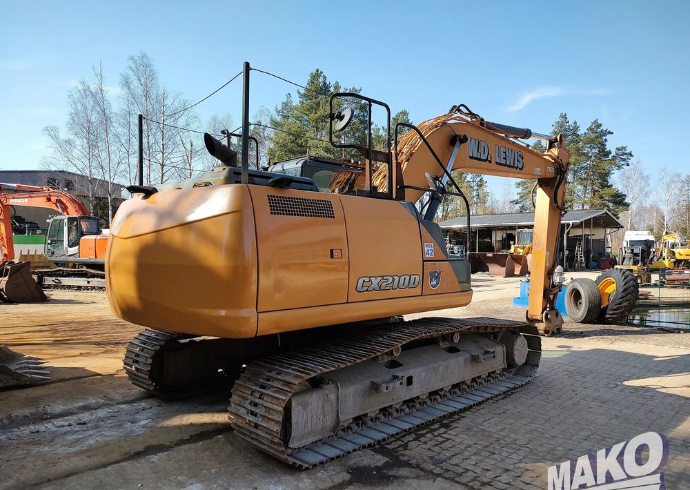 Komatsu CX 210 D - Telakaivukone: kuva Komatsu CX 210 D - Telakaivukone Komatsu CX 210 D - Telakaivukone: kuva Komatsu CX 210 D - Telakaivukone