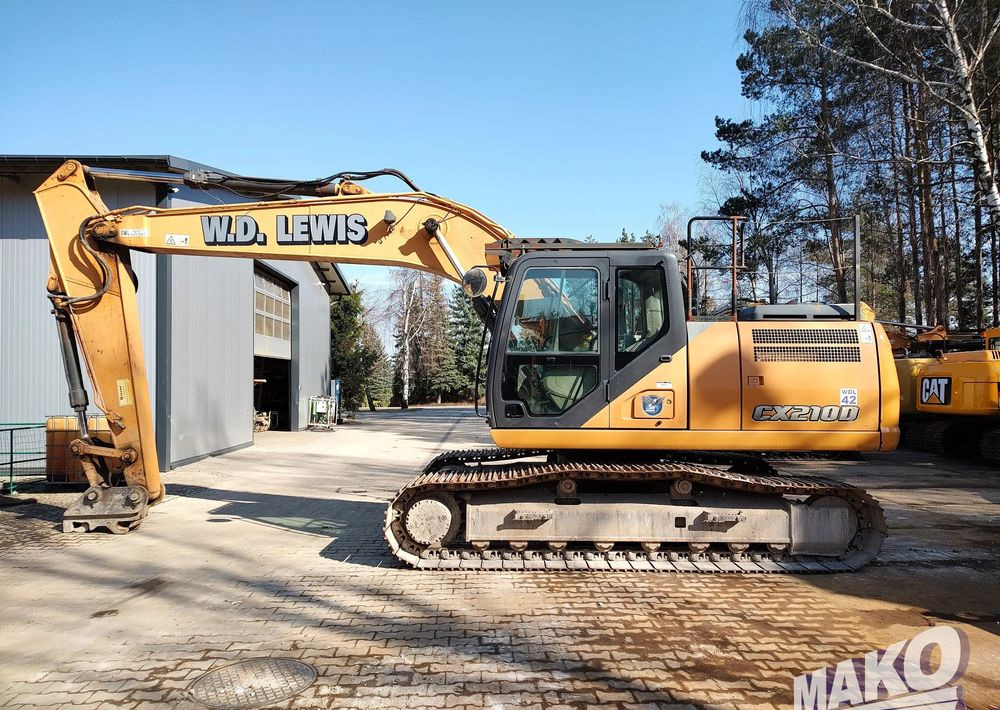 Komatsu CX 210 D - Telakaivukone: kuva Komatsu CX 210 D - Telakaivukone Komatsu CX 210 D - Telakaivukone: kuva Komatsu CX 210 D - Telakaivukone