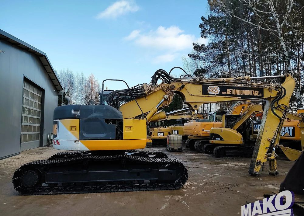 Komatsu PC228USLC-3 - Telakaivukone: kuva Komatsu PC228USLC-3 - Telakaivukone Komatsu PC228USLC-3 - Telakaivukone: kuva Komatsu PC228USLC-3 - Telakaivukone