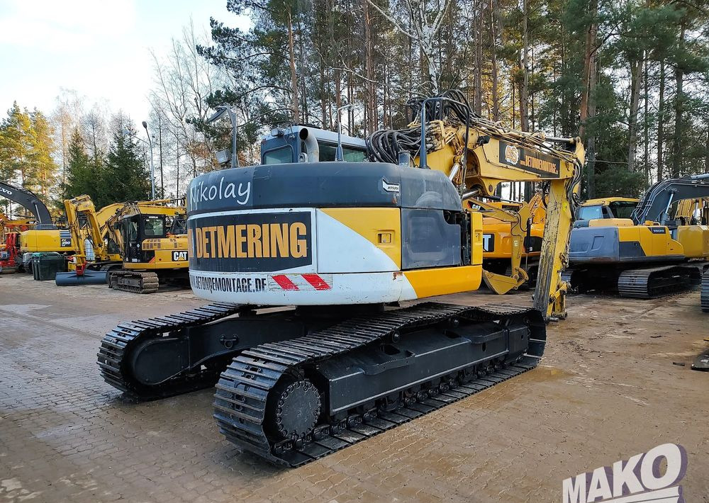 Komatsu PC228USLC-3 - Telakaivukone: kuva Komatsu PC228USLC-3 - Telakaivukone Komatsu PC228USLC-3 - Telakaivukone: kuva Komatsu PC228USLC-3 - Telakaivukone