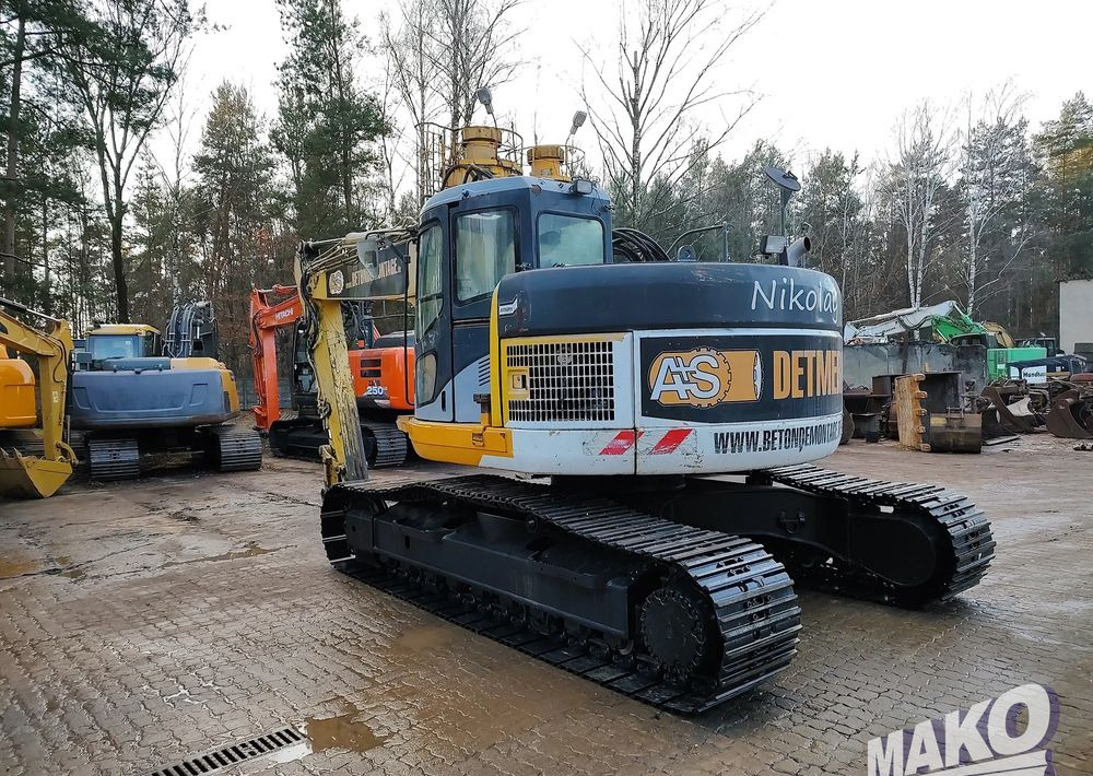 Komatsu PC228USLC-3 - Telakaivukone: kuva Komatsu PC228USLC-3 - Telakaivukone Komatsu PC228USLC-3 - Telakaivukone: kuva Komatsu PC228USLC-3 - Telakaivukone