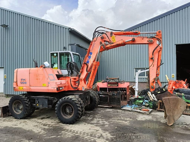 FIAT-HITACHI FH120W bandenkraan Wheel Excavator graafmachine - Pyöräalustainen kaivinkone: kuva FIAT-HITACHI FH120W bandenkraan Wheel Excavator graafmachine - Pyöräalustainen kaivinkone FIAT-HITACHI FH120W bandenkraan Wheel Excavator graafmachine - Pyöräalustainen kaivinkone: kuva FIAT-HITACHI FH120W bandenkraan Wheel Excavator graafmachine - Pyöräalustainen kaivinkone