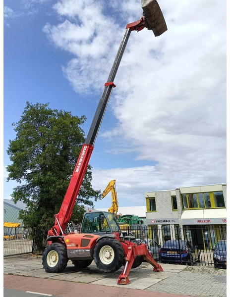 Manitou MT 1337 SL T 13 m verreiker telehandler lader 3,7T - Kurottaja: kuva Manitou MT 1337 SL T 13 m verreiker telehandler lader 3,7T - Kurottaja Manitou MT 1337 SL T 13 m verreiker telehandler lader 3,7T - Kurottaja: kuva Manitou MT 1337 SL T 13 m verreiker telehandler lader 3,7T - Kurottaja