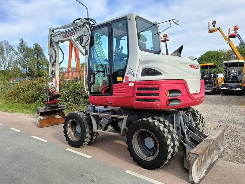 Takeuchi TB 295 W mobiele graafmachine mobile excavator - Pyöräalustainen kaivinkone: kuva Takeuchi TB 295 W mobiele graafmachine mobile excavator - Pyöräalustainen kaivinkone Takeuchi TB 295 W mobiele graafmachine mobile excavator - Pyöräalustainen kaivinkone: kuva Takeuchi TB 295 W mobiele graafmachine mobile excavator - Pyöräalustainen kaivinkone
