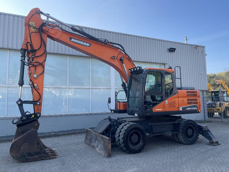 Doosan DX170W-5 - Pyöräalustainen kaivinkone: kuva Doosan DX170W-5 - Pyöräalustainen kaivinkone Doosan DX170W-5 - Pyöräalustainen kaivinkone: kuva Doosan DX170W-5 - Pyöräalustainen kaivinkone