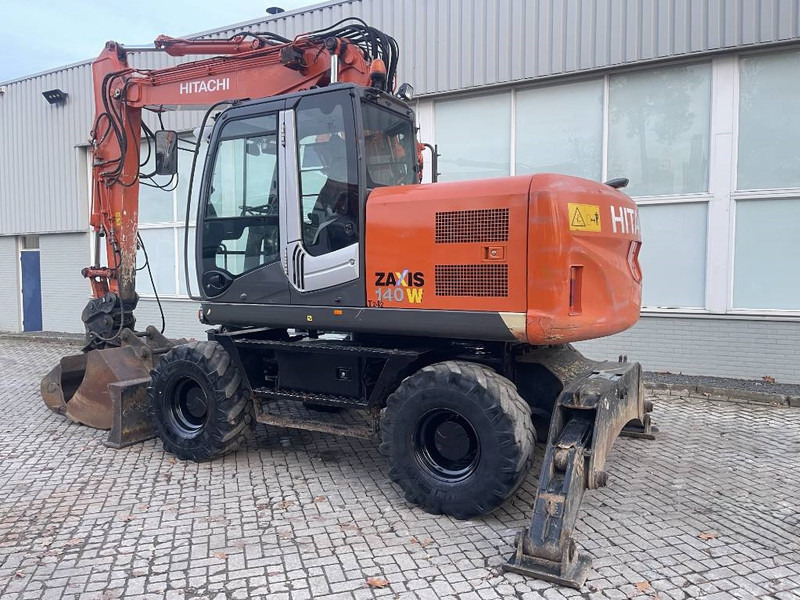 Hitachi ZX 140 W-3 - Pyöräalustainen kaivinkone: kuva Hitachi ZX 140 W-3 - Pyöräalustainen kaivinkone Hitachi ZX 140 W-3 - Pyöräalustainen kaivinkone: kuva Hitachi ZX 140 W-3 - Pyöräalustainen kaivinkone