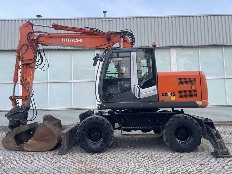 Hitachi ZX 140 W-3 - Pyöräalustainen kaivinkone: kuva Hitachi ZX 140 W-3 - Pyöräalustainen kaivinkone Hitachi ZX 140 W-3 - Pyöräalustainen kaivinkone: kuva Hitachi ZX 140 W-3 - Pyöräalustainen kaivinkone