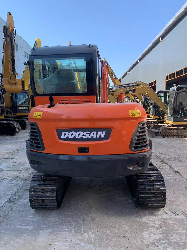 DOOSAN Mini Excavator Doosan DX60, DX55 - Telakaivukone: kuva DOOSAN Mini Excavator Doosan DX60, DX55 - Telakaivukone DOOSAN Mini Excavator Doosan DX60, DX55 - Telakaivukone: kuva DOOSAN Mini Excavator Doosan DX60, DX55 - Telakaivukone