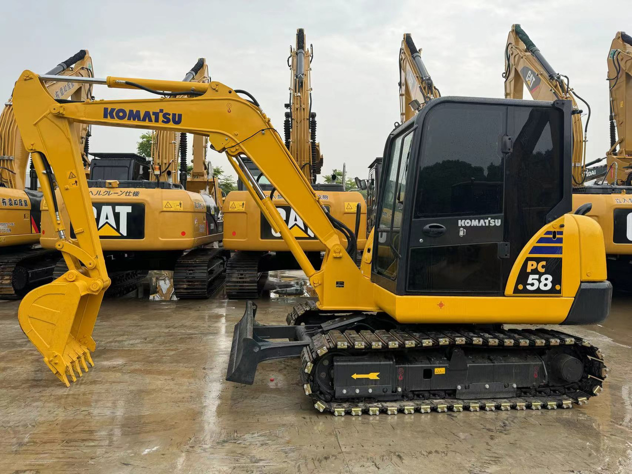 Komatsu PC58, PC56, PC55 Small Excavator With Rubber Tracks - Telakaivukone: kuva Komatsu PC58, PC56, PC55 Small Excavator With Rubber Tracks - Telakaivukone Komatsu PC58, PC56, PC55 Small Excavator With Rubber Tracks - Telakaivukone: kuva Komatsu PC58, PC56, PC55 Small Excavator With Rubber Tracks - Telakaivukone
