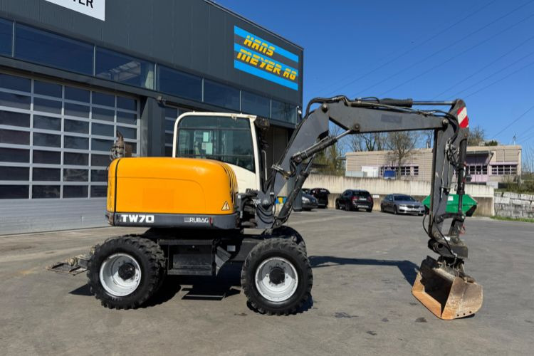 Terex TW70 3x Schaufeln mit SWS - Pyöräalustainen kaivinkone: kuva Terex TW70 3x Schaufeln mit SWS - Pyöräalustainen kaivinkone Terex TW70 3x Schaufeln mit SWS - Pyöräalustainen kaivinkone: kuva Terex TW70 3x Schaufeln mit SWS - Pyöräalustainen kaivinkone