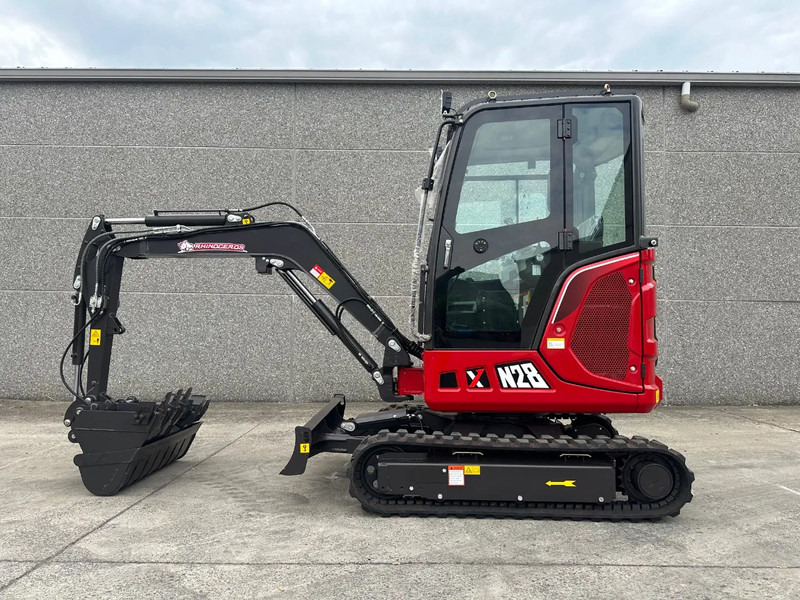 Rhinoceros XN28 - Minikuormaaja: kuva Rhinoceros XN28 - Minikuormaaja Rhinoceros XN28 - Minikuormaaja: kuva Rhinoceros XN28 - Minikuormaaja