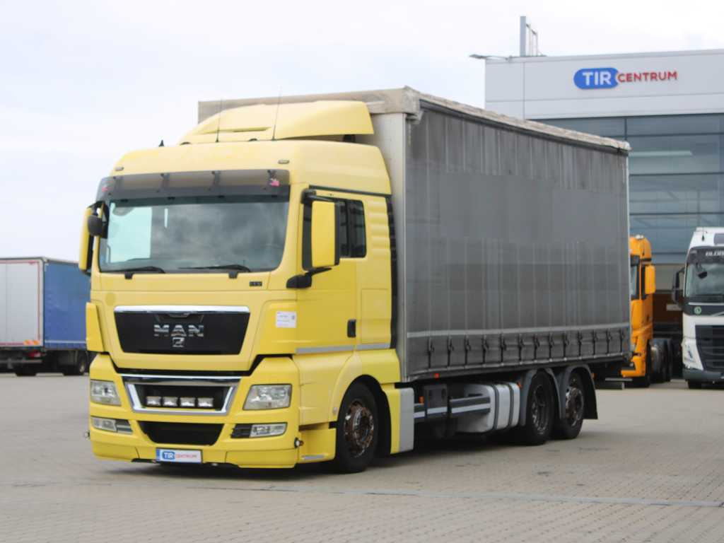 MAN TGX 24.440, EURO 5EEV, 6X2, AIR SUSPENSION - Pressukapelli kuorma-auto: kuva MAN TGX 24.440, EURO 5EEV, 6X2, AIR SUSPENSION - Pressukapelli kuorma-auto MAN TGX 24.440, EURO 5EEV, 6X2, AIR SUSPENSION - Pressukapelli kuorma-auto: kuva MAN TGX 24.440, EURO 5EEV, 6X2, AIR SUSPENSION - Pressukapelli kuorma-auto