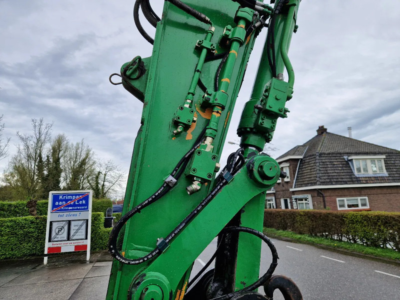 Pyöräalustainen kaivinkone Hyundai Robex 160W-9A met 6-cilinder Cummins motor: kuva Pyöräalustainen kaivinkone Hyundai Robex 160W-9A met 6-cilinder Cummins motor