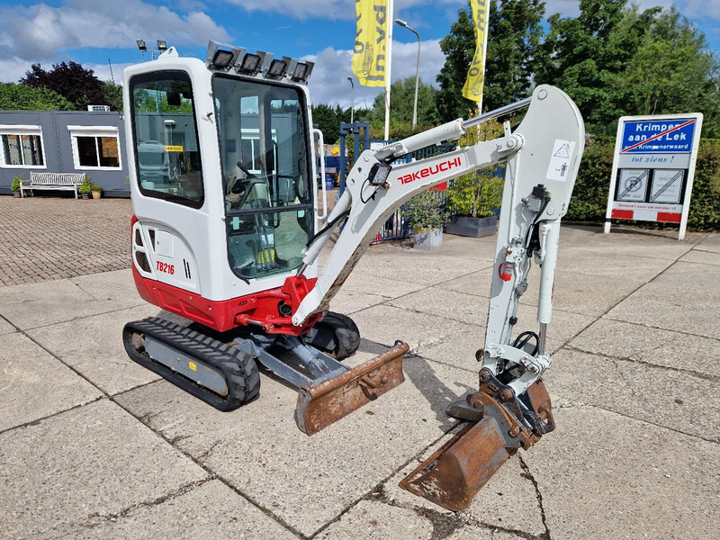 Takeuchi TB216 met 2089 uur - Minikuormaaja: kuva Takeuchi TB216 met 2089 uur - Minikuormaaja Takeuchi TB216 met 2089 uur - Minikuormaaja: kuva Takeuchi TB216 met 2089 uur - Minikuormaaja