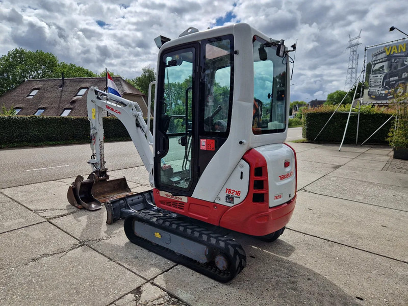 Takeuchi TB216 met 2089 uur - Minikuormaaja: kuva Takeuchi TB216 met 2089 uur - Minikuormaaja Takeuchi TB216 met 2089 uur - Minikuormaaja: kuva Takeuchi TB216 met 2089 uur - Minikuormaaja