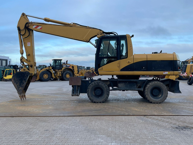 Caterpillar M318C - Kaivuri: kuva Caterpillar M318C - Kaivuri Caterpillar M318C - Kaivuri: kuva Caterpillar M318C - Kaivuri