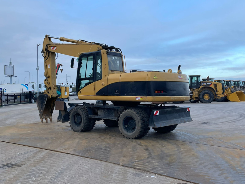 Caterpillar M318C - Kaivuri: kuva Caterpillar M318C - Kaivuri Caterpillar M318C - Kaivuri: kuva Caterpillar M318C - Kaivuri