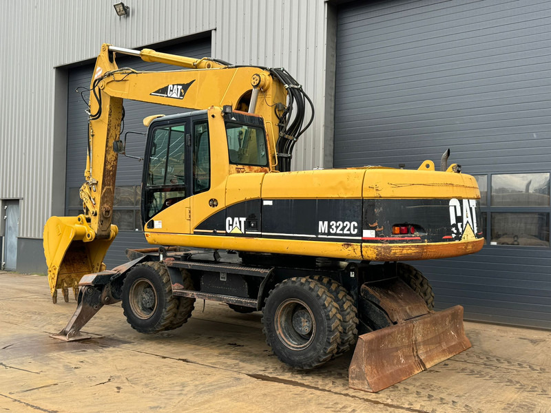 Caterpillar M322C - Hydraulic stabilizers / VA Triple boom / CE-certified, - Pyöräalustainen kaivinkone: kuva Caterpillar M322C - Hydraulic stabilizers / VA Triple boom / CE-certified, - Pyöräalustainen kaivinkone Caterpillar M322C - Hydraulic stabilizers / VA Triple boom / CE-certified, - Pyöräalustainen kaivinkone: kuva Caterpillar M322C - Hydraulic stabilizers / VA Triple boom / CE-certified, - Pyöräalustainen kaivinkone