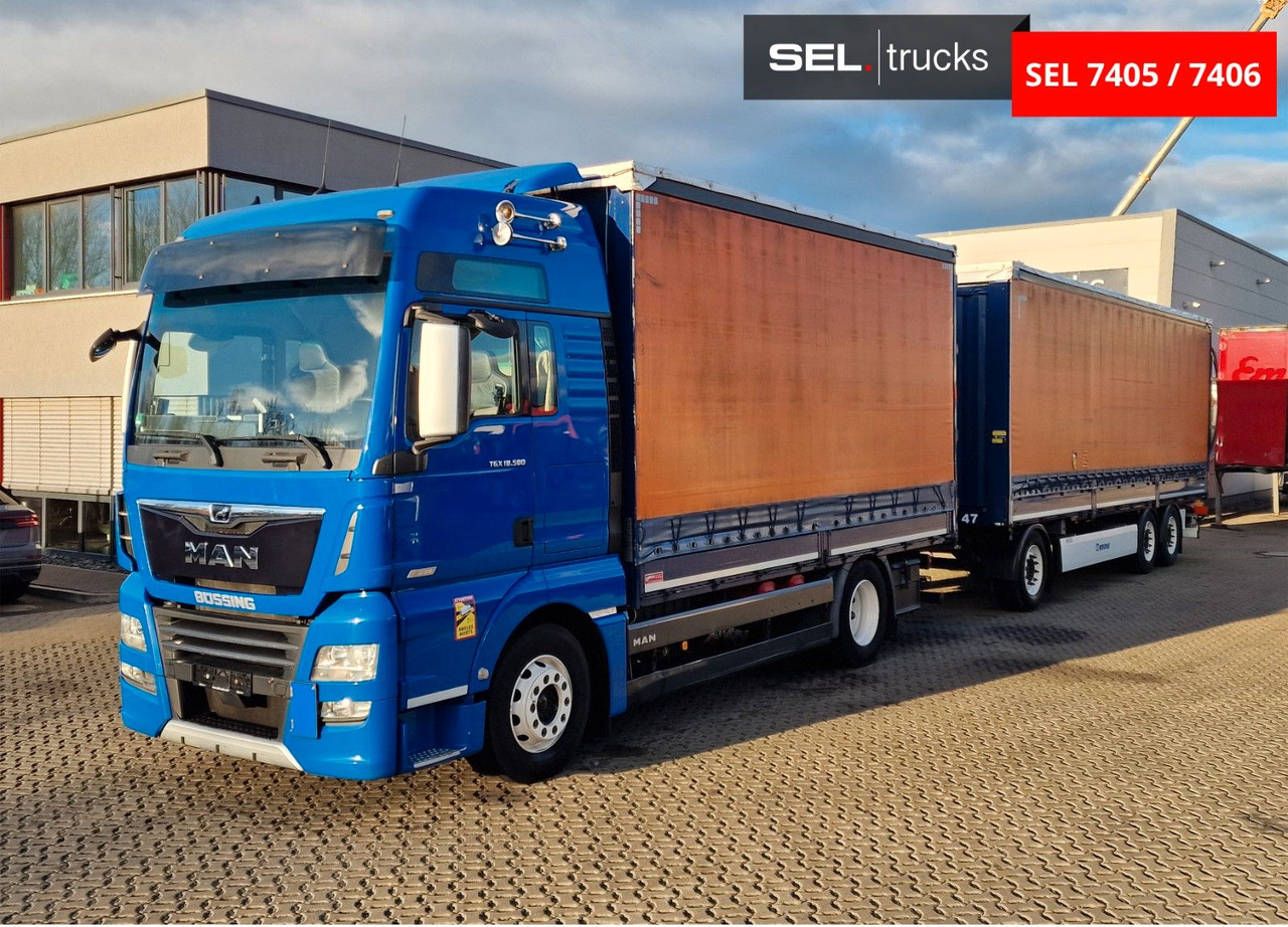 MAN TGX 18.580 4X2 LL/ Intarder/Aluklappen/Durchlade - Pressukapelli kuorma-auto: kuva MAN TGX 18.580 4X2 LL/ Intarder/Aluklappen/Durchlade - Pressukapelli kuorma-auto MAN TGX 18.580 4X2 LL/ Intarder/Aluklappen/Durchlade - Pressukapelli kuorma-auto: kuva MAN TGX 18.580 4X2 LL/ Intarder/Aluklappen/Durchlade - Pressukapelli kuorma-auto