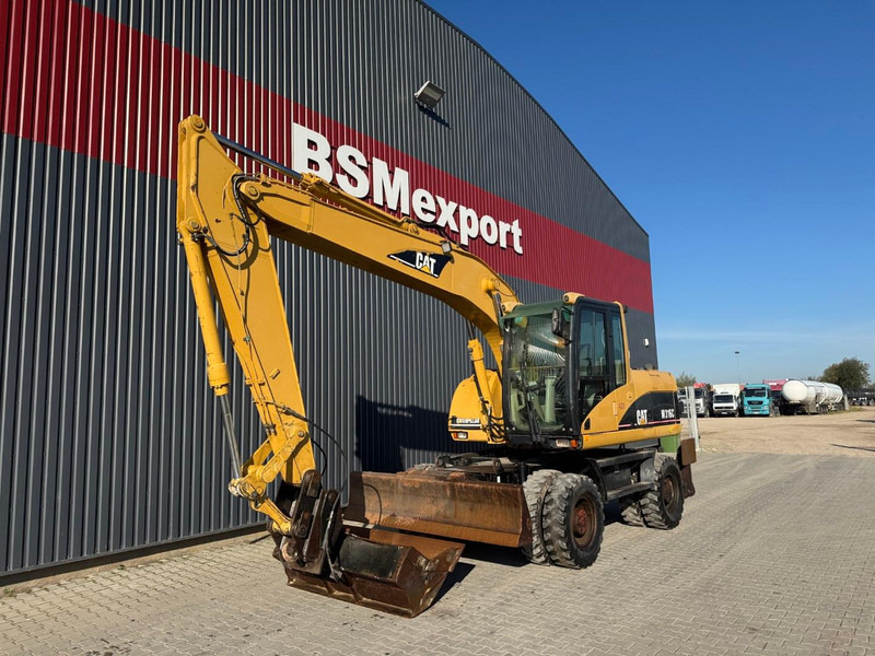 Caterpillar M 316 C - Pyöräalustainen kaivinkone: kuva Caterpillar M 316 C - Pyöräalustainen kaivinkone Caterpillar M 316 C - Pyöräalustainen kaivinkone: kuva Caterpillar M 316 C - Pyöräalustainen kaivinkone