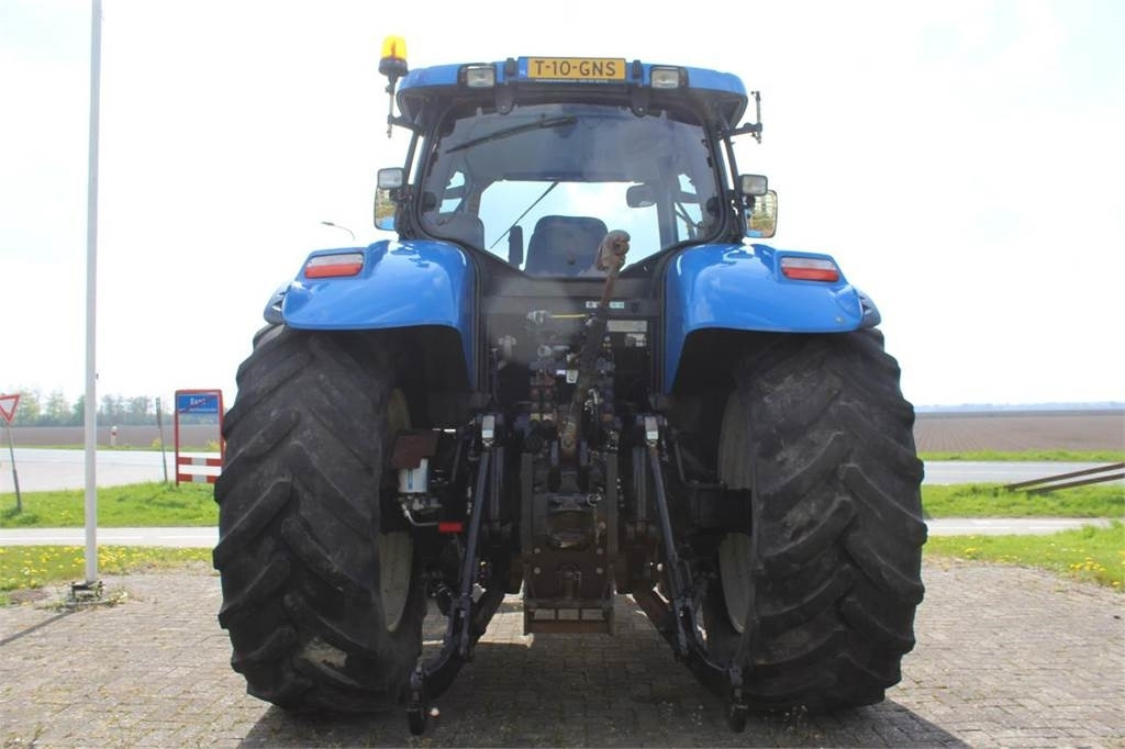 New Holland T7050 - Traktori: kuva New Holland T7050 - Traktori New Holland T7050 - Traktori: kuva New Holland T7050 - Traktori