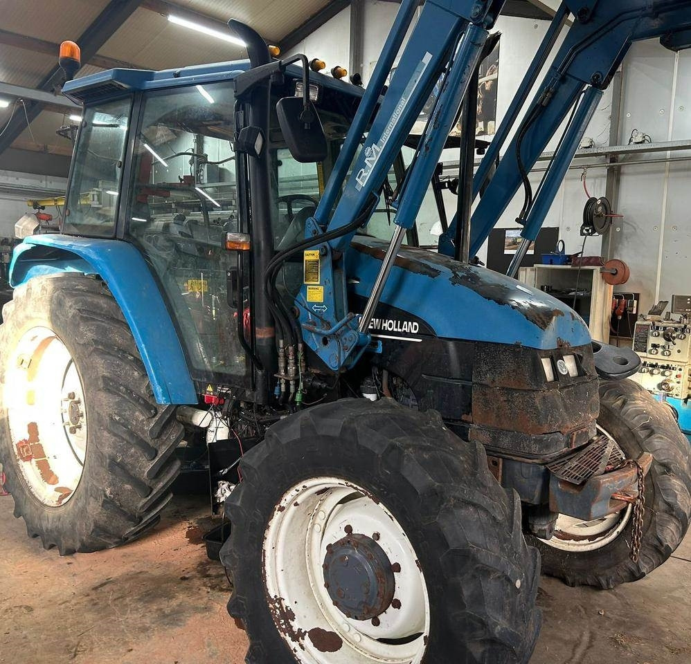 New Holland TS 90 - Traktori: kuva New Holland TS 90 - Traktori New Holland TS 90 - Traktori: kuva New Holland TS 90 - Traktori
