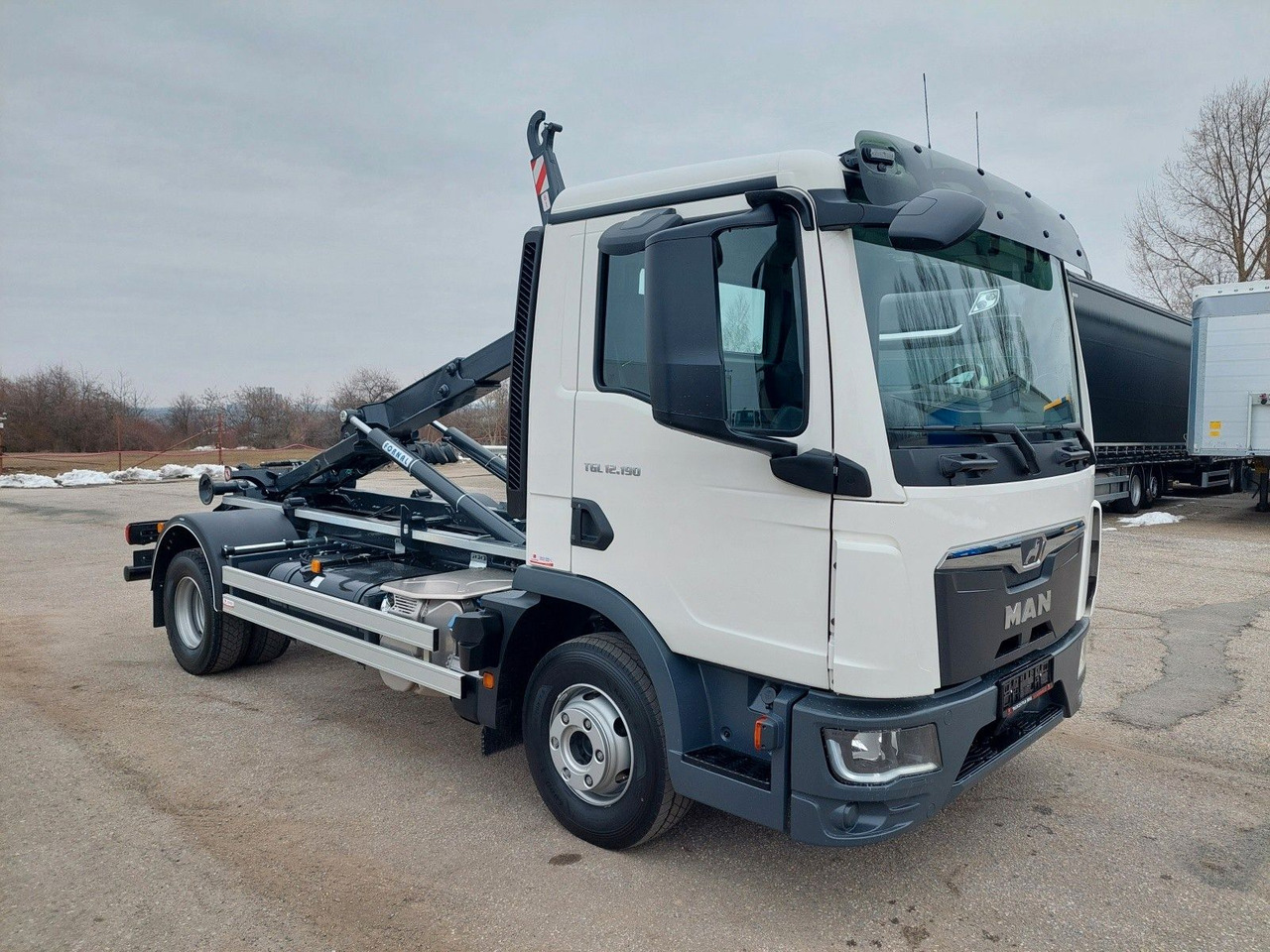 MAN TG3 TGL 12.190 BB 4x2 - Koukkulava kuorma-auto: kuva MAN TG3 TGL 12.190 BB 4x2 - Koukkulava kuorma-auto MAN TG3 TGL 12.190 BB 4x2 - Koukkulava kuorma-auto: kuva MAN TG3 TGL 12.190 BB 4x2 - Koukkulava kuorma-auto