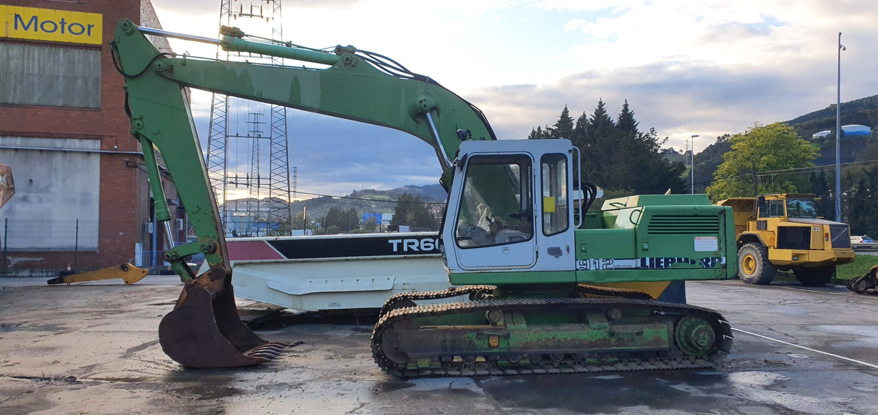 LIEBHERR R912LI - Telakaivukone: kuva LIEBHERR R912LI - Telakaivukone LIEBHERR R912LI - Telakaivukone: kuva LIEBHERR R912LI - Telakaivukone
