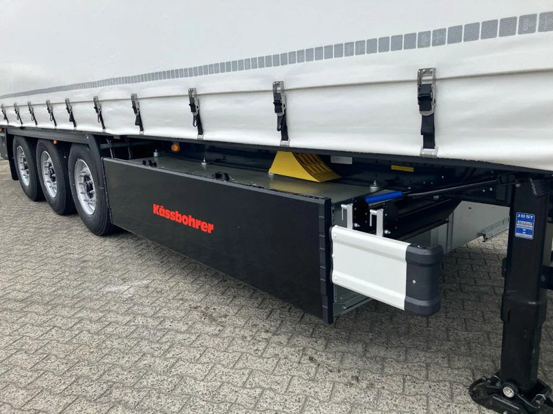 Uusi Pressukapellipuoliperävaunu Kässbohrer SCS X+ / 90 - 12 / 27 Schuifzeilen multiplex vloer met palletkist 30 Europallets: kuva Uusi Pressukapellipuoliperävaunu Kässbohrer SCS X+ / 90 - 12 / 27 Schuifzeilen multiplex vloer met palletkist 30 Europallets