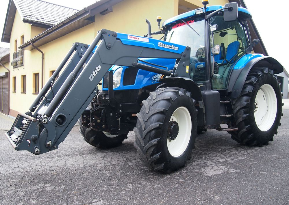 Ciągnik New Holland NH TS125A 6 cylindrów 2004 Ciągnik rolniczy New Holland TS125A - Traktori: kuva Ciągnik New Holland NH TS125A 6 cylindrów 2004 Ciągnik rolniczy New Holland TS125A - Traktori Ciągnik New Holland NH TS125A 6 cylindrów 2004 Ciągnik rolniczy New Holland TS125A - Traktori: kuva Ciągnik New Holland NH TS125A 6 cylindrów 2004 Ciągnik rolniczy New Holland TS125A - Traktori