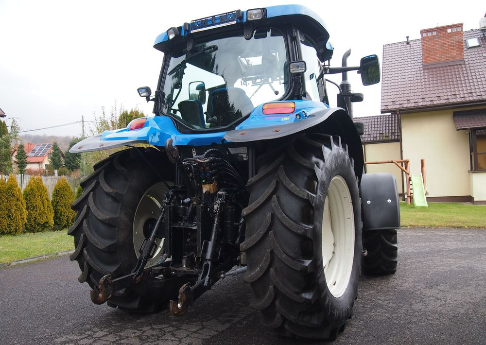 Ciągnik New Holland NH TS125A 6 cylindrów 2004 Ciągnik rolniczy New Holland TS125A - Traktori: kuva Ciągnik New Holland NH TS125A 6 cylindrów 2004 Ciągnik rolniczy New Holland TS125A - Traktori Ciągnik New Holland NH TS125A 6 cylindrów 2004 Ciągnik rolniczy New Holland TS125A - Traktori: kuva Ciągnik New Holland NH TS125A 6 cylindrów 2004 Ciągnik rolniczy New Holland TS125A - Traktori
