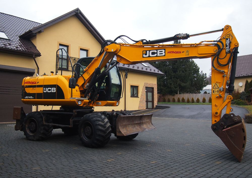 Koparka kołowa JCB JS145W 2011 Koparka JCB - Pyöräalustainen kaivinkone: kuva Koparka kołowa JCB JS145W 2011 Koparka JCB - Pyöräalustainen kaivinkone Koparka kołowa JCB JS145W 2011 Koparka JCB - Pyöräalustainen kaivinkone: kuva Koparka kołowa JCB JS145W 2011 Koparka JCB - Pyöräalustainen kaivinkone