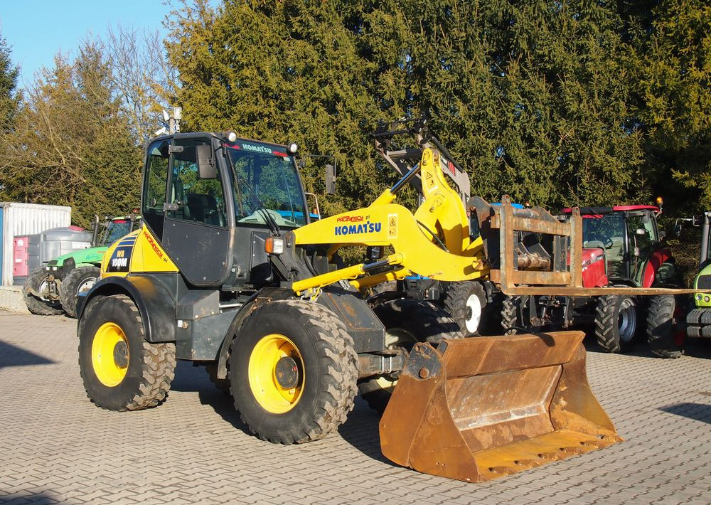 Ładowarka Komatsu WA100M 2007 Ładowarka Komatsu - Pyöräkuormaaja: kuva Ładowarka Komatsu WA100M 2007 Ładowarka Komatsu - Pyöräkuormaaja Ładowarka Komatsu WA100M 2007 Ładowarka Komatsu - Pyöräkuormaaja: kuva Ładowarka Komatsu WA100M 2007 Ładowarka Komatsu - Pyöräkuormaaja