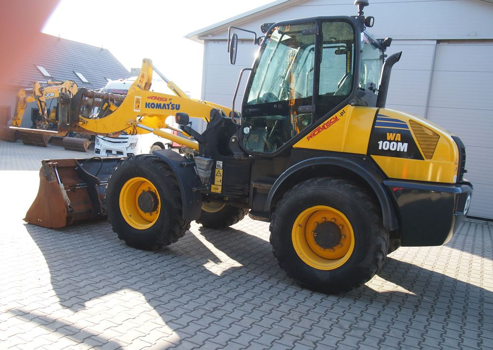 Ładowarka Komatsu WA100M 2007 Ładowarka Komatsu - Pyöräkuormaaja: kuva Ładowarka Komatsu WA100M 2007 Ładowarka Komatsu - Pyöräkuormaaja Ładowarka Komatsu WA100M 2007 Ładowarka Komatsu - Pyöräkuormaaja: kuva Ładowarka Komatsu WA100M 2007 Ładowarka Komatsu - Pyöräkuormaaja