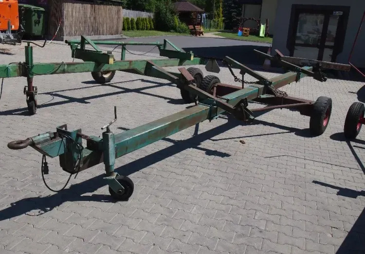 Kuljetusvaunu - leikkuupöytä Wózek do kombajnu pod heder do zboża: kuva Kuljetusvaunu - leikkuupöytä Wózek do kombajnu pod heder do zboża Kuljetusvaunu - leikkuupöytä Wózek do kombajnu pod heder do zboża: kuva Kuljetusvaunu - leikkuupöytä Wózek do kombajnu pod heder do zboża