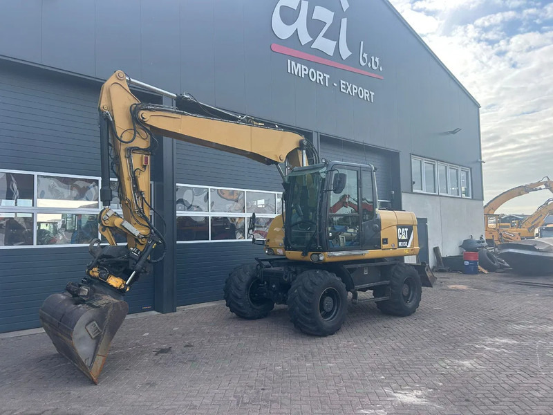 Caterpillar M313D - Pyöräalustainen kaivinkone: kuva Caterpillar M313D - Pyöräalustainen kaivinkone Caterpillar M313D - Pyöräalustainen kaivinkone: kuva Caterpillar M313D - Pyöräalustainen kaivinkone