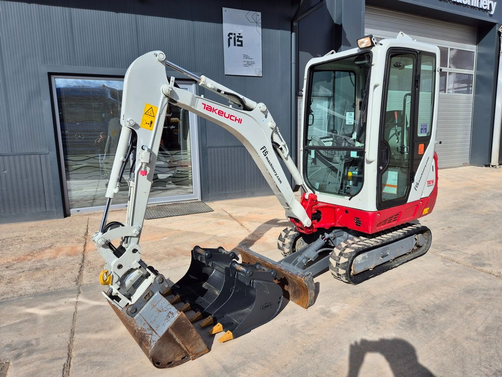 Takeuchi TB216 - 2022 Year - 1335 Hours - Powertilt - Minikuormaaja: kuva  Takeuchi TB216 - 2022 Year - 1335 Hours - Powertilt - Minikuormaaja Takeuchi TB216 - 2022 Year - 1335 Hours - Powertilt - Minikuormaaja: kuva  Takeuchi TB216 - 2022 Year - 1335 Hours - Powertilt - Minikuormaaja