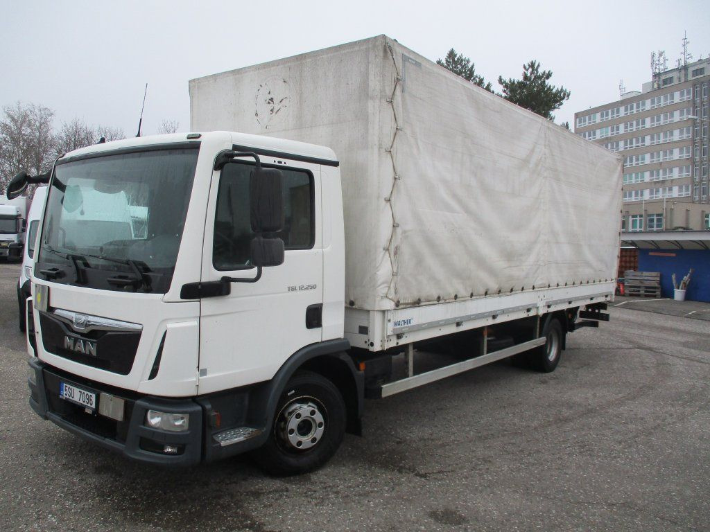 MAN TGL 12.250 - Pressukapelli kuorma-auto: kuva MAN TGL 12.250 - Pressukapelli kuorma-auto MAN TGL 12.250 - Pressukapelli kuorma-auto: kuva MAN TGL 12.250 - Pressukapelli kuorma-auto