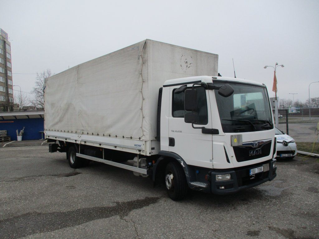 MAN TGL 12.250 - Pressukapelli kuorma-auto: kuva MAN TGL 12.250 - Pressukapelli kuorma-auto MAN TGL 12.250 - Pressukapelli kuorma-auto: kuva MAN TGL 12.250 - Pressukapelli kuorma-auto