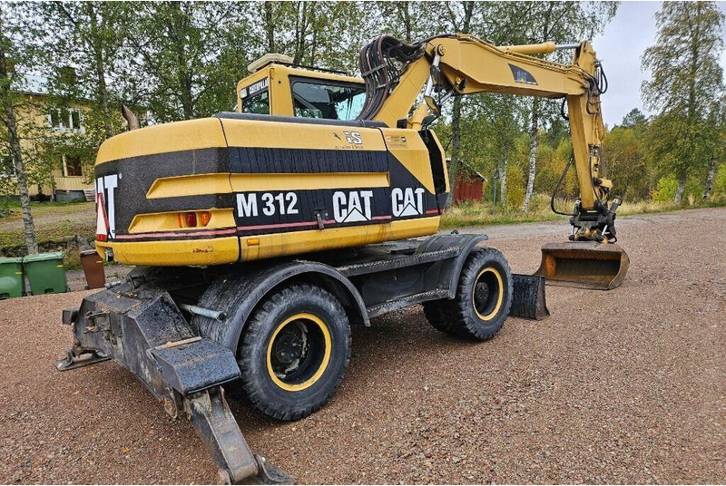Caterpillar M312 Engcon EC20 tiltrotator - Pyöräalustainen kaivinkone: kuva Caterpillar M312 Engcon EC20 tiltrotator - Pyöräalustainen kaivinkone Caterpillar M312 Engcon EC20 tiltrotator - Pyöräalustainen kaivinkone: kuva Caterpillar M312 Engcon EC20 tiltrotator - Pyöräalustainen kaivinkone