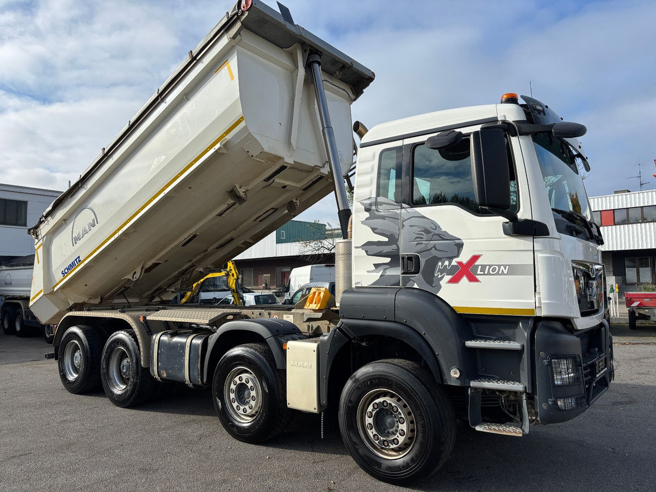 Kippiauto kuorma-auto MAN TGS41.510 8x4 Schmitz Muldenkipper Retarder/19m³: kuva Kippiauto kuorma-auto MAN TGS41.510 8x4 Schmitz Muldenkipper Retarder/19m³ Kippiauto kuorma-auto MAN TGS41.510 8x4 Schmitz Muldenkipper Retarder/19m³: kuva Kippiauto kuorma-auto MAN TGS41.510 8x4 Schmitz Muldenkipper Retarder/19m³